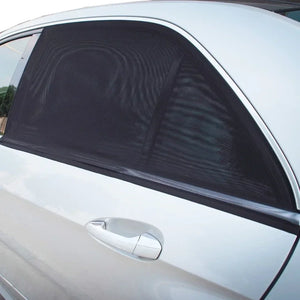 Black slip-over mesh shade fitted to a door-window frame