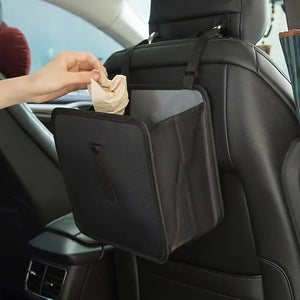 Black car trash bag behind a seat during use