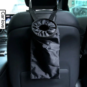 Fabric trash bag hanging behind a headrest