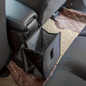 Open hanging car bag beside a center console showing gray lining