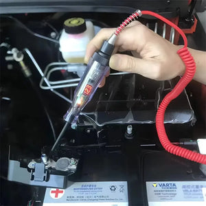 Handheld probe tester illustrated beside a car battery