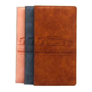 Brown, black and pink vehicle document holders