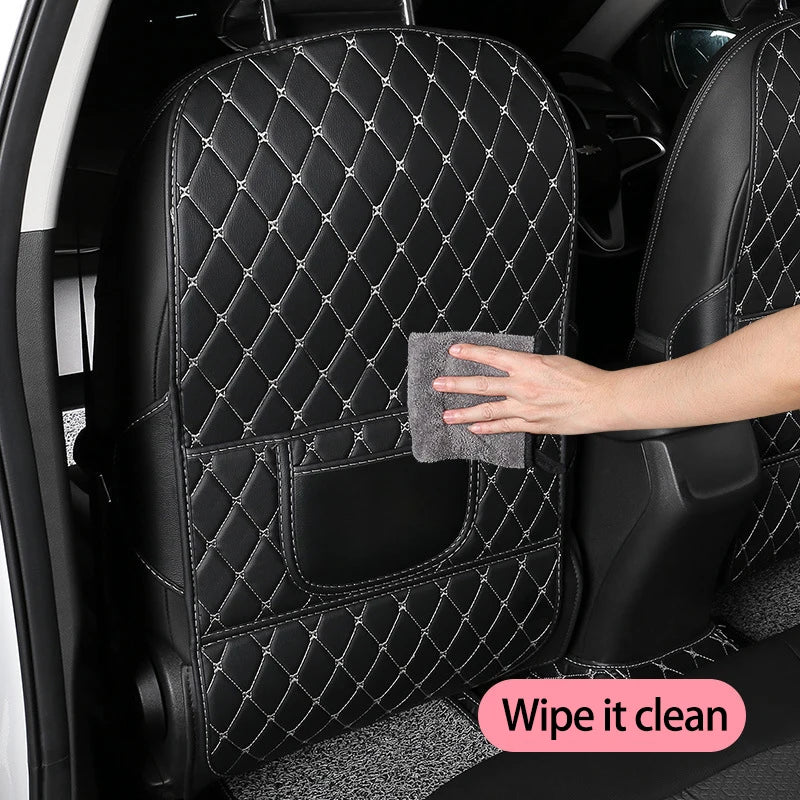 Hand wiping the front of a stitched seat protector
