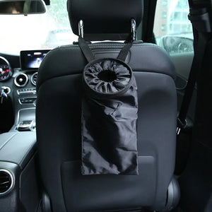 Fabric trash bag installed behind a car seat