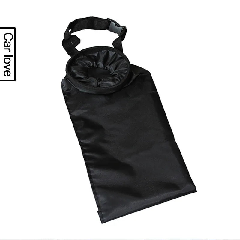 Black hanging fabric trash bag on a white background
