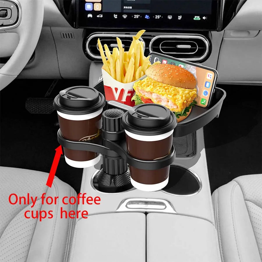 Cup-holder tray positioned beside a center console