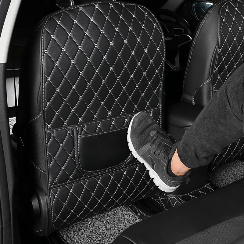 Long seat-back protector positioned against rear-seat foot contact
