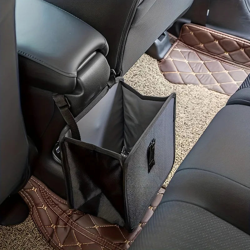 Open hanging car bag beside a center console showing gray lining