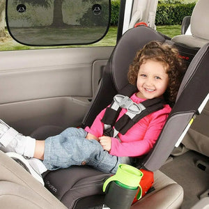 Rear-window shade pictured beside a child passenger