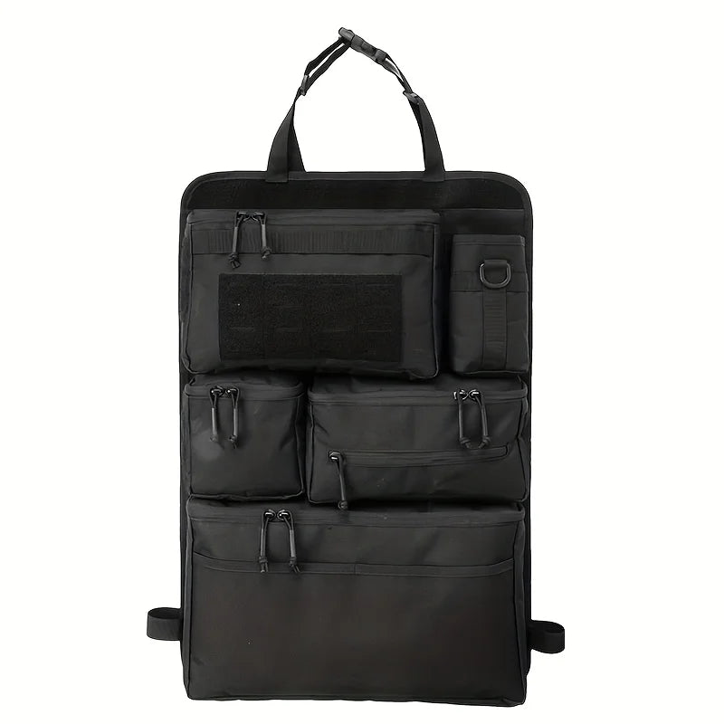 Black seat-back storage panel with top strap
