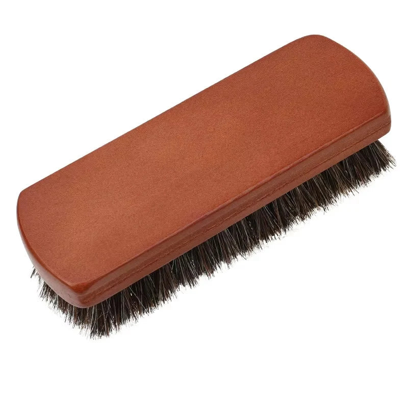 Narrow rectangular bristle brush on a white background